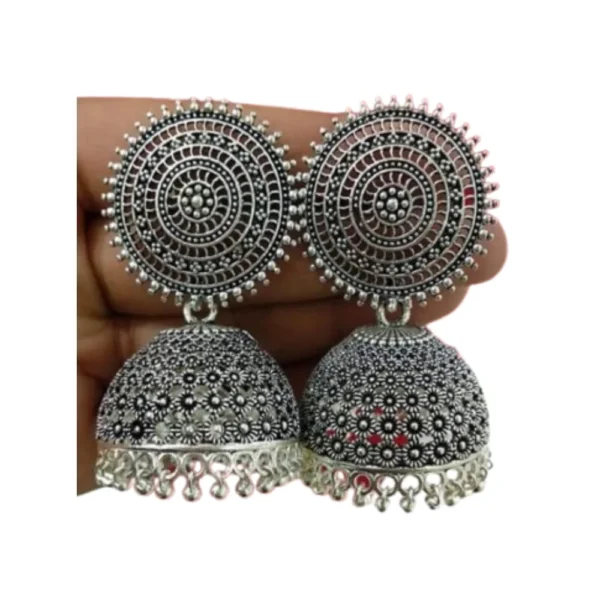 White decorative female earrings